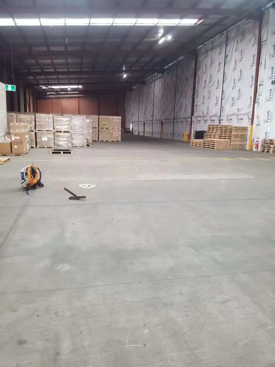 Large factory and warehouse floor after commercial cleaning