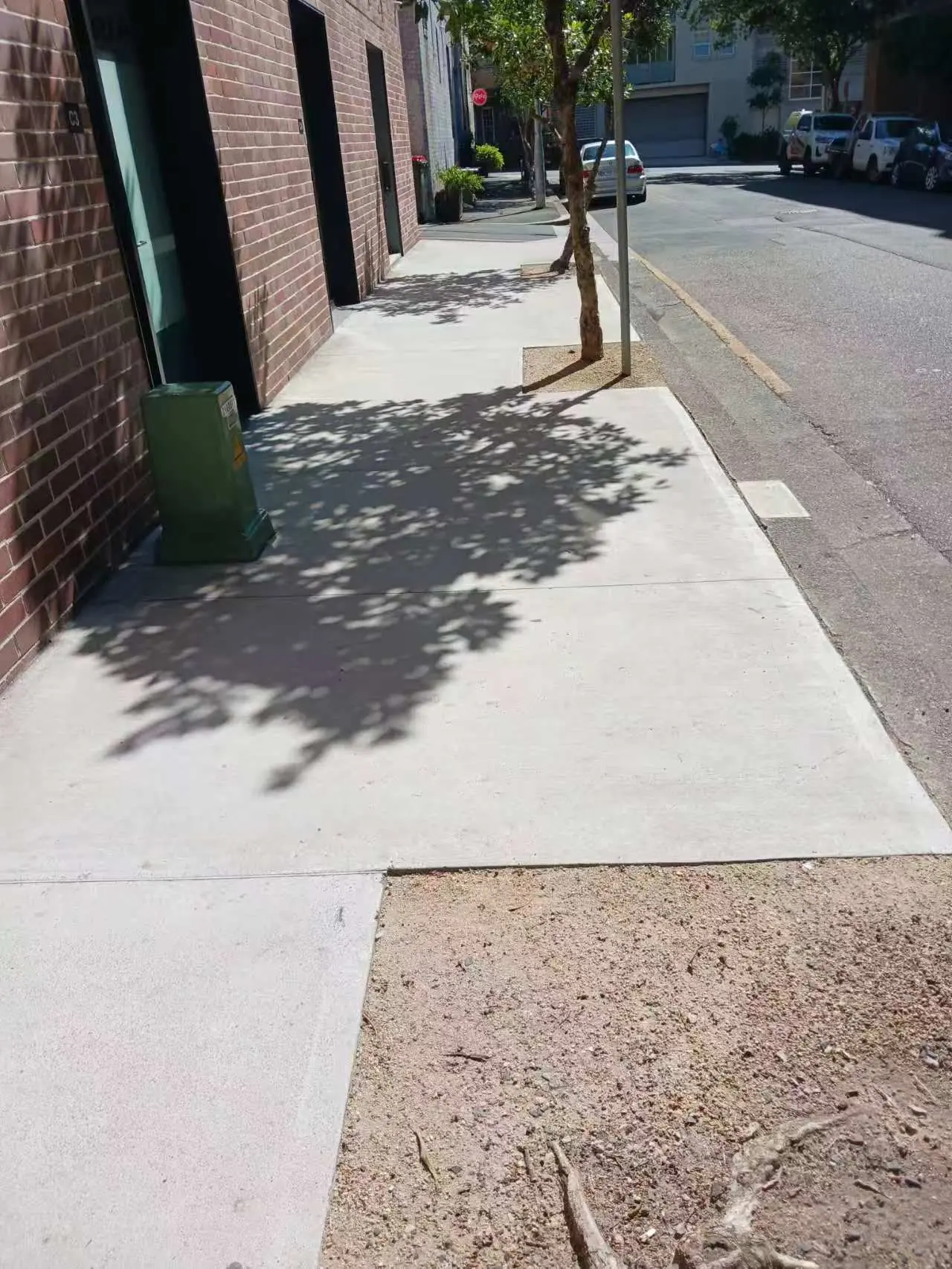 Clean external pathway beside a managed strata building