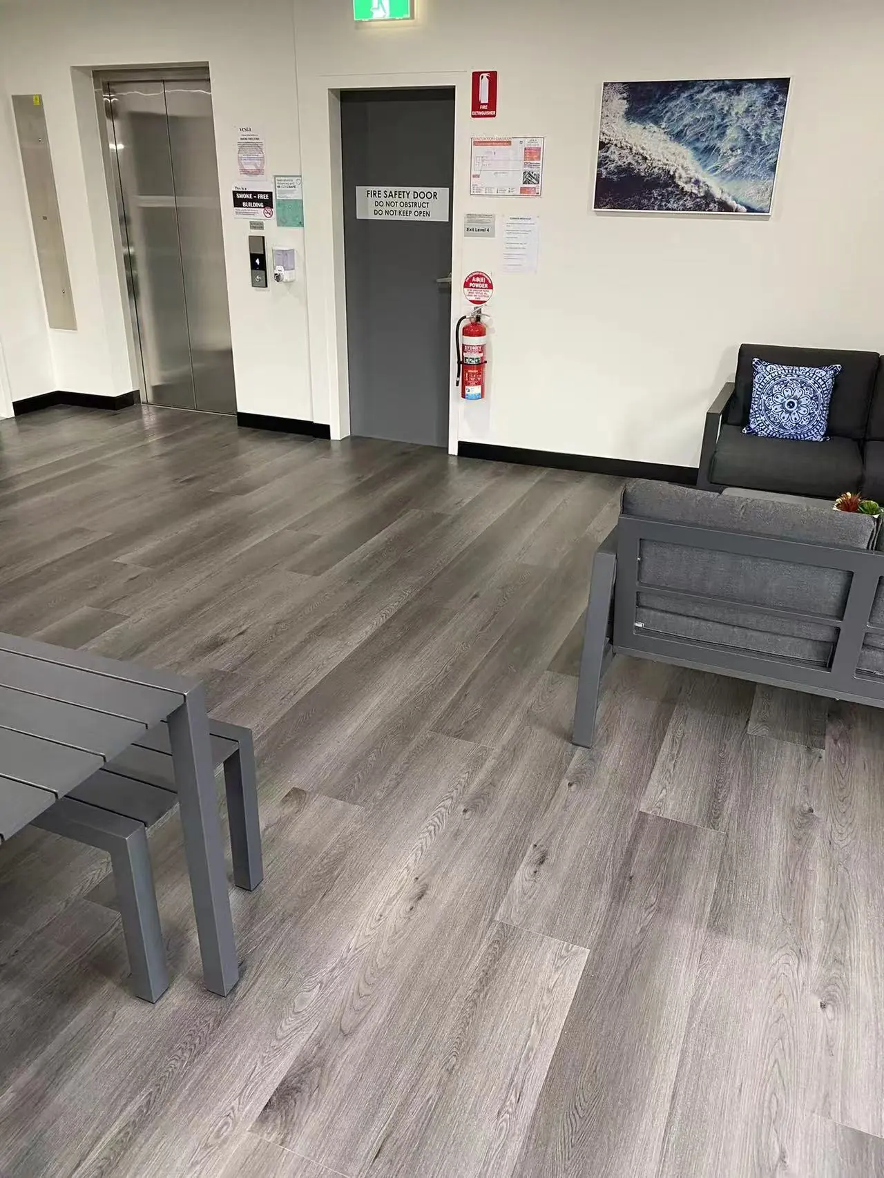 Clean strata lift lobby and shared resident lounge