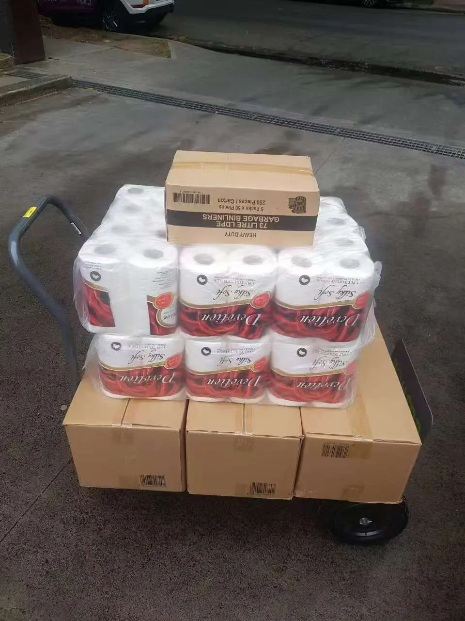 Bulk washroom paper products and facility consumables being delivered to a managed property